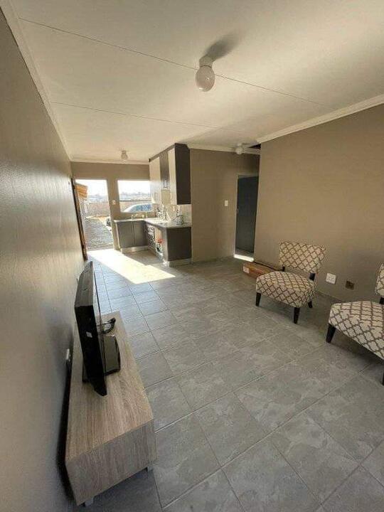 Furnished living room in a unit at Austin Villas Estate