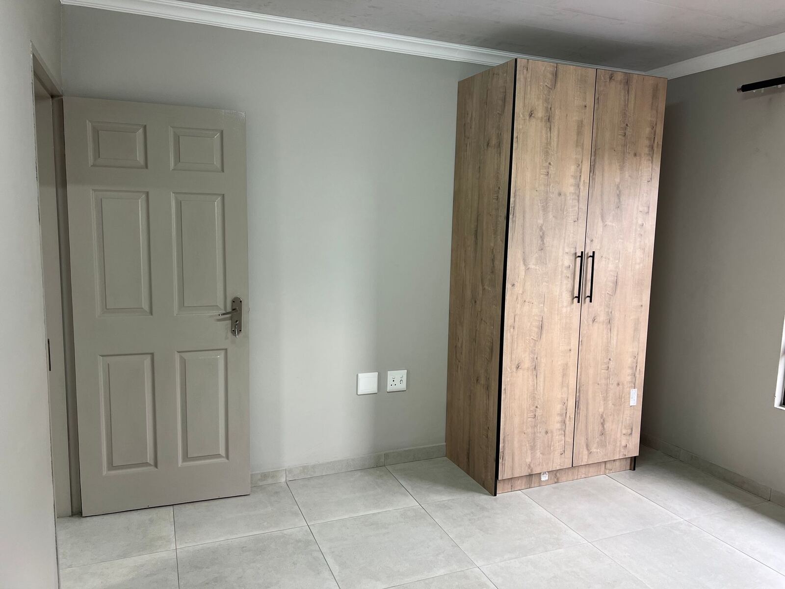 Bedroom with built-in cupboard